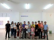 In the program, the children were presented gifts, including candy, milk, clothes, toys…