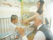 SNA teachers taking care of children in Hoa Binh Village