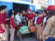 iSchool students visited and gave New Year gifts to poor people
