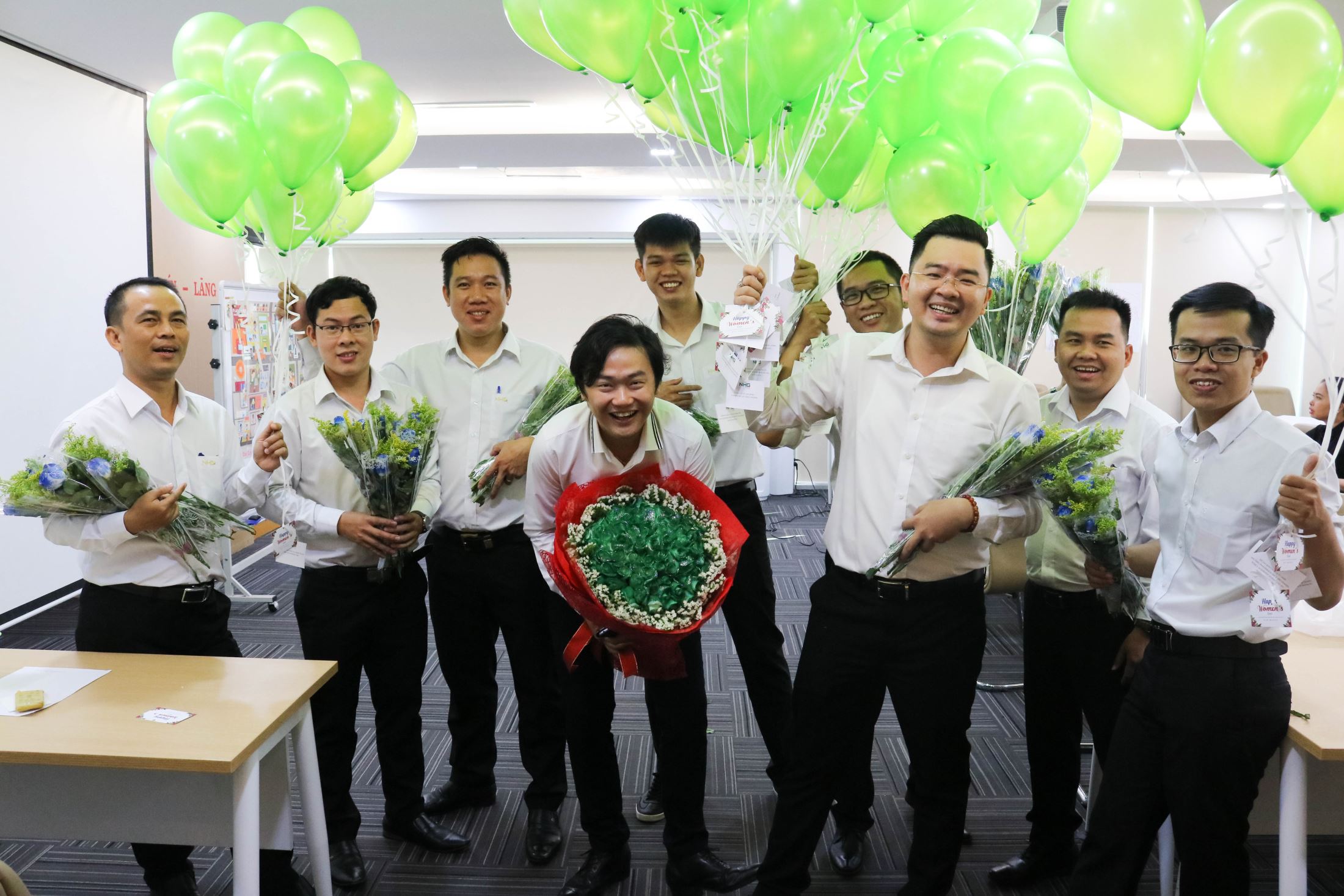 To prepare for this special day, all the male staff has elaborately decorated the office with green balloons attached with various wishes for the female