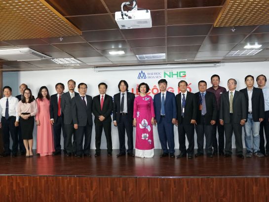 NHG board of directors, members in the new board of management, Professor, Dr. Mai Hong Quy and HSU lecturers taking photos in the ceremony.