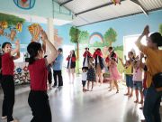 Students and teachers of Saigon Academy international kindergarten organizing activities at Phu Hoa orphanage, Quang Ngai.