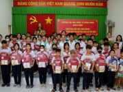 The joyful smiles of children receiving gifts to support their education. 